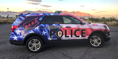 Draper, Utah police car with a custom vinyl wrap photo - Interstate Image Emergency vehicle wraps and spot graphics