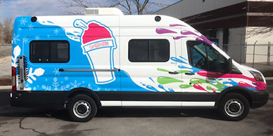 Ford Transit van with vibrant vinyl wrap - Full wraps for vans in Salt Lake City, Utah